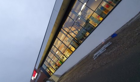 Nettoyage de la vitrerie deux faces d'Intermarché à Saint-Romain-Le-Puy